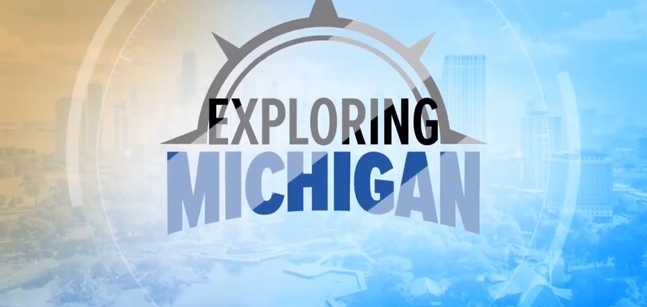 The image features the text “Exploring Michigan” in bold letters, with a stylized compass design above and a faded cityscape background blending orange and blue tones.